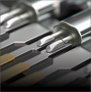 Industry Standards - Close-up of precision-machined high-speed connector contacts with gold and silver plating